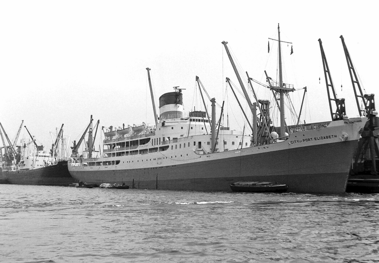 A vintage transatlantic cargo liner docked at port